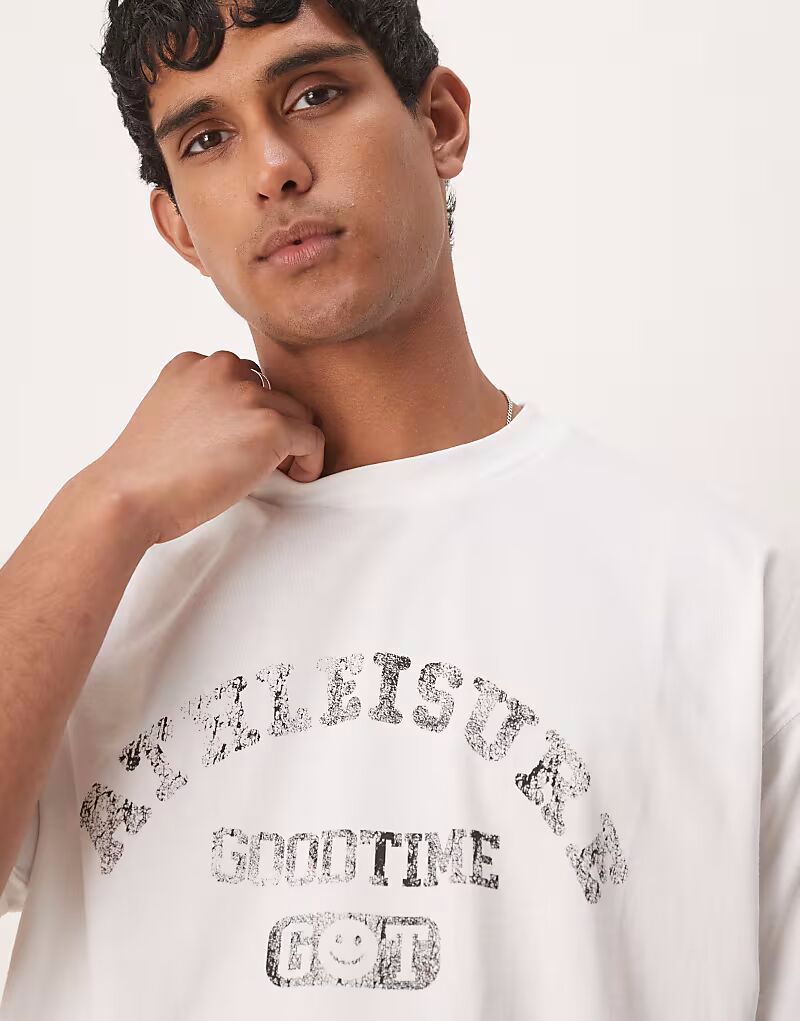 

Футболка свободного кроя ASOS DESIGN свободного кроя со спортивной графикой белого цвета