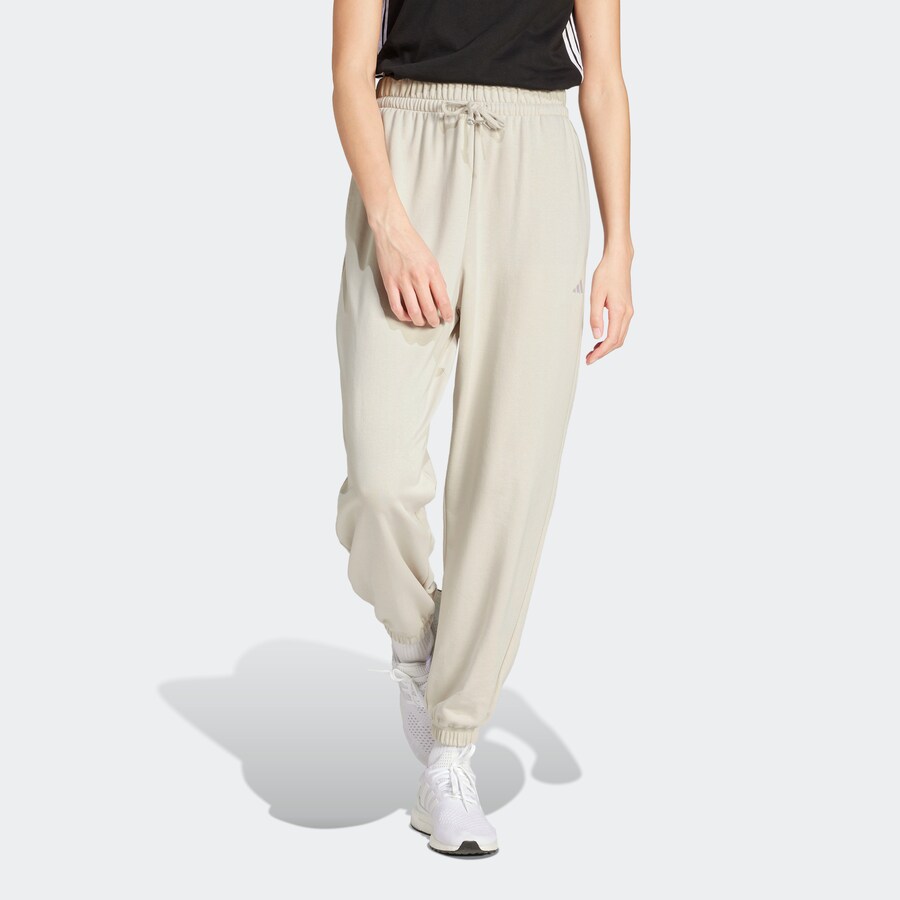 Зауженные тренировочные брюки ADIDAS SPORTSWEAR Essentials, кремовый — фото 2
