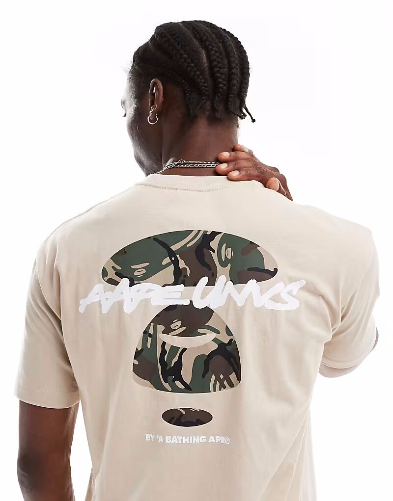 

Футболка с логотипом Aape By A Bathing Ape и камуфляжным принтом на спине бежевого цвета