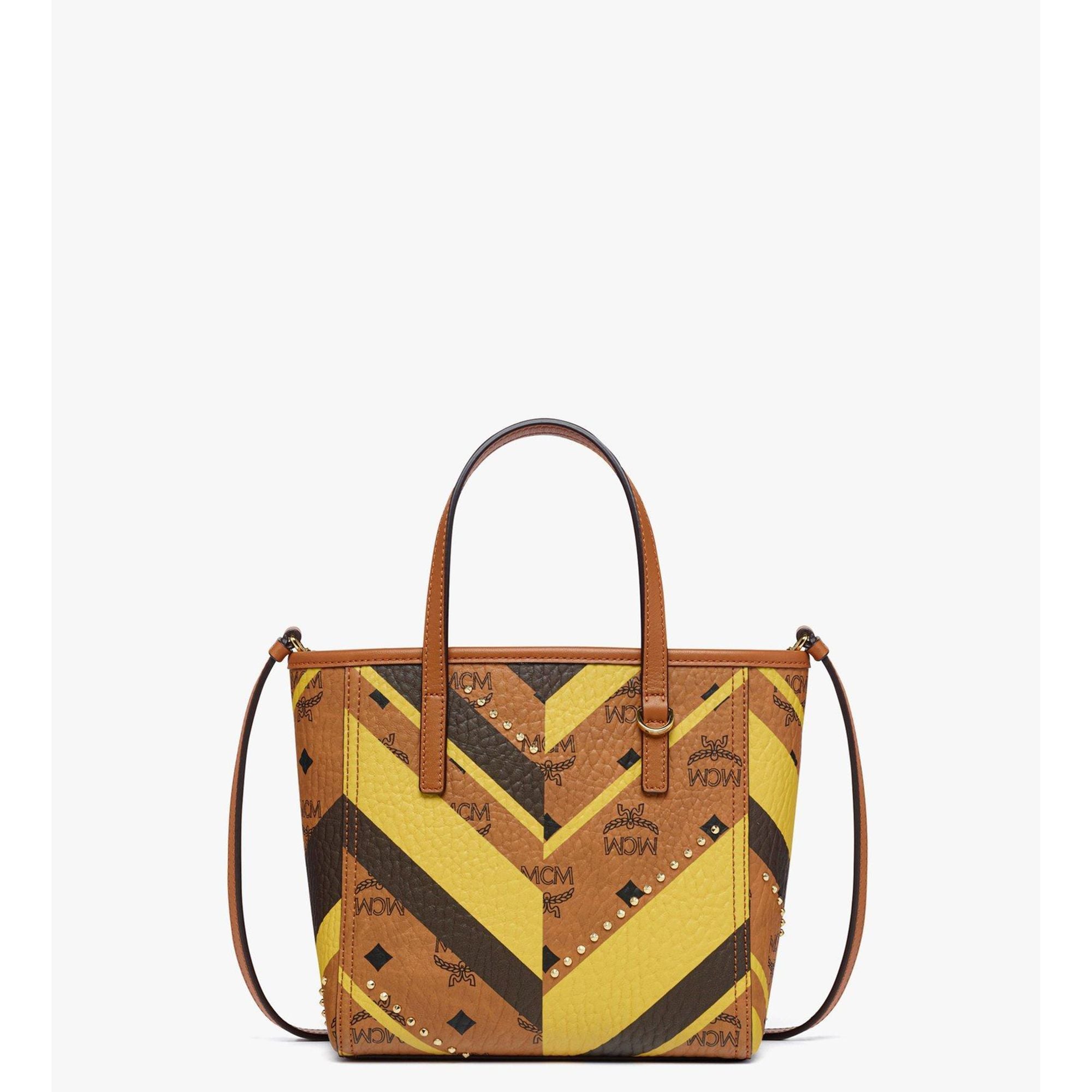 

Сумка-шоппер Toni с застежкой-молнией и крупным узором «елочка» от Studded Toni Top-zip Visetos MCM, коричневый