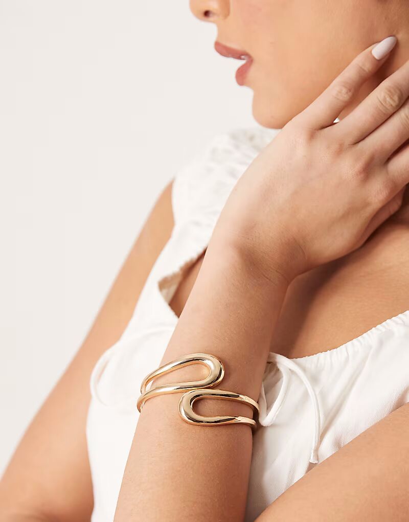 

Браслет-манжета с обернутым открытым дизайном в золотистом оттенке Asos Design