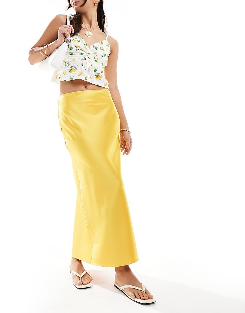 

Желтая атласная юбка миди со смещением ASOS DESIGN