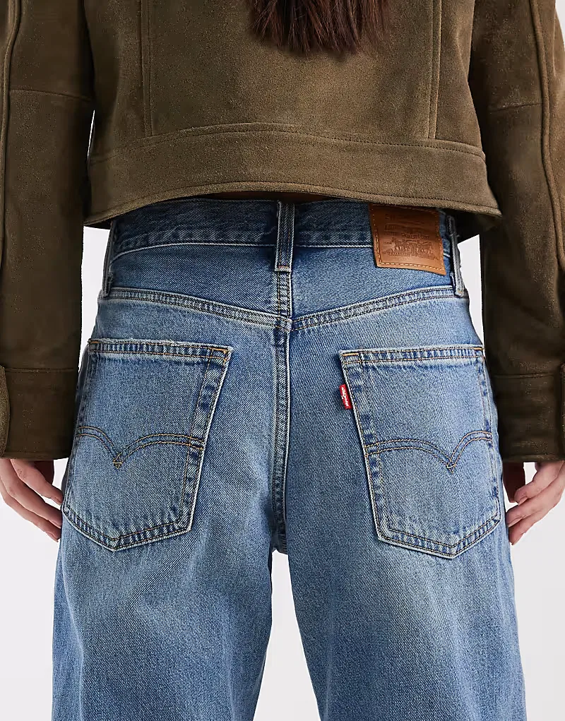 Свободные джинсы-клеш Levi's средней степени выния — фото 4