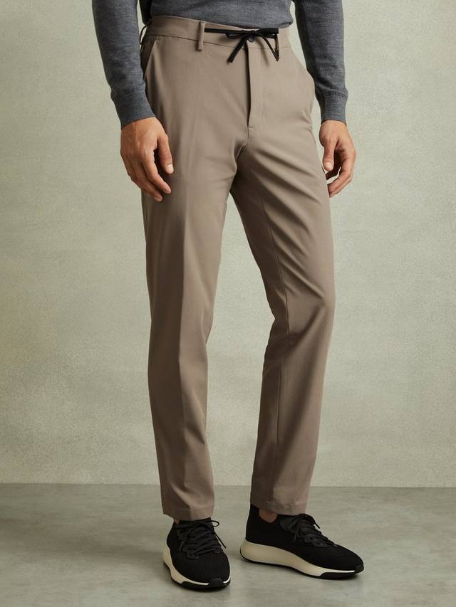 

Технические брюки с разрезом на завязках Reiss, цвет Taupe Brown