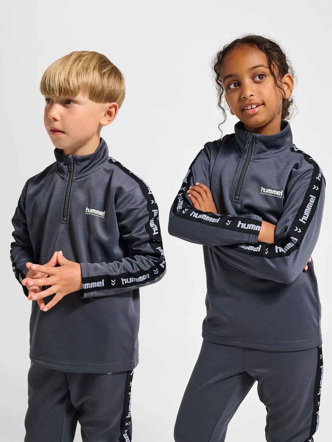 Детское худи с полузамком Hmljr Goal Tape Halfzip Hummel, Ebenholzbraun