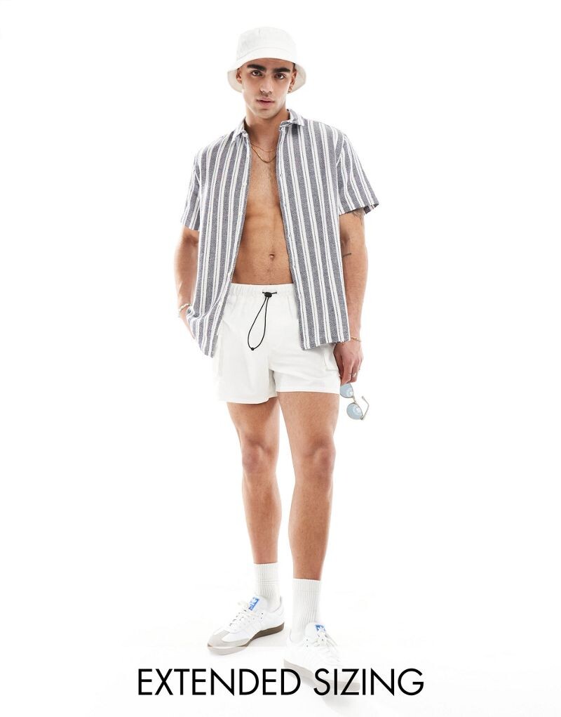 

Темно-синяя рубашка свободного кроя с фактурными полосками ASOS DESIGN