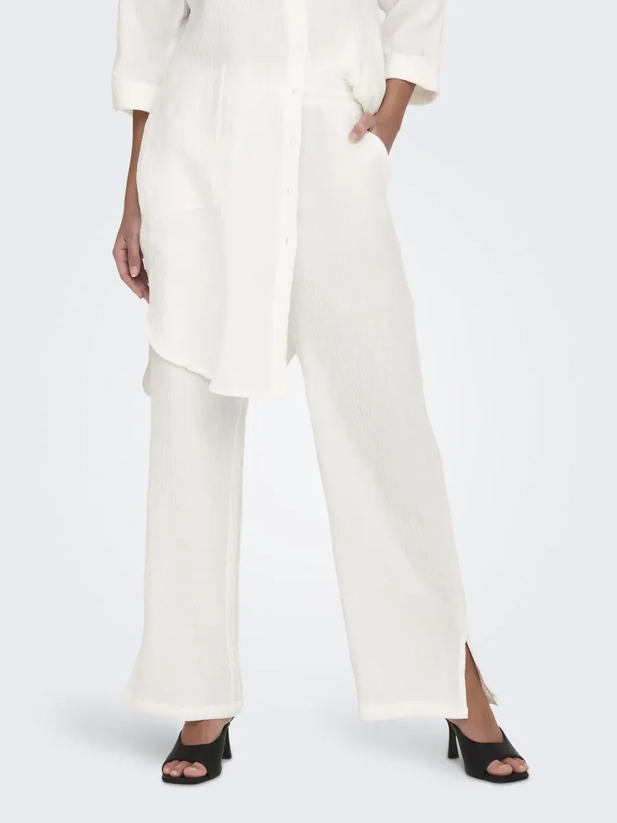 

Брюки-слипоны JDY "JDYTHEIS LIFE WIDE SLIT PANT WVN NOOS", цвет Cloud Dancer