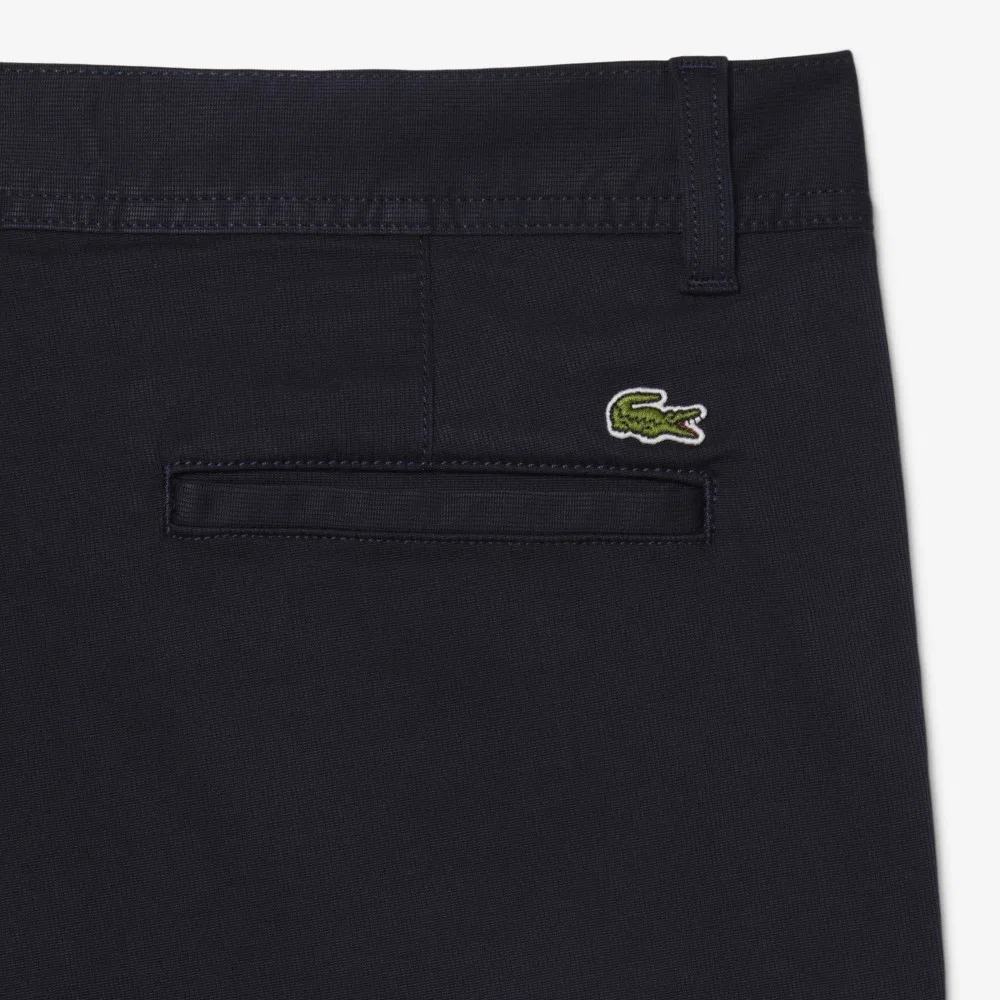 Мужские вельветовые брюки в мелкий рубчик тёмно-синие от Lacoste — фото 4