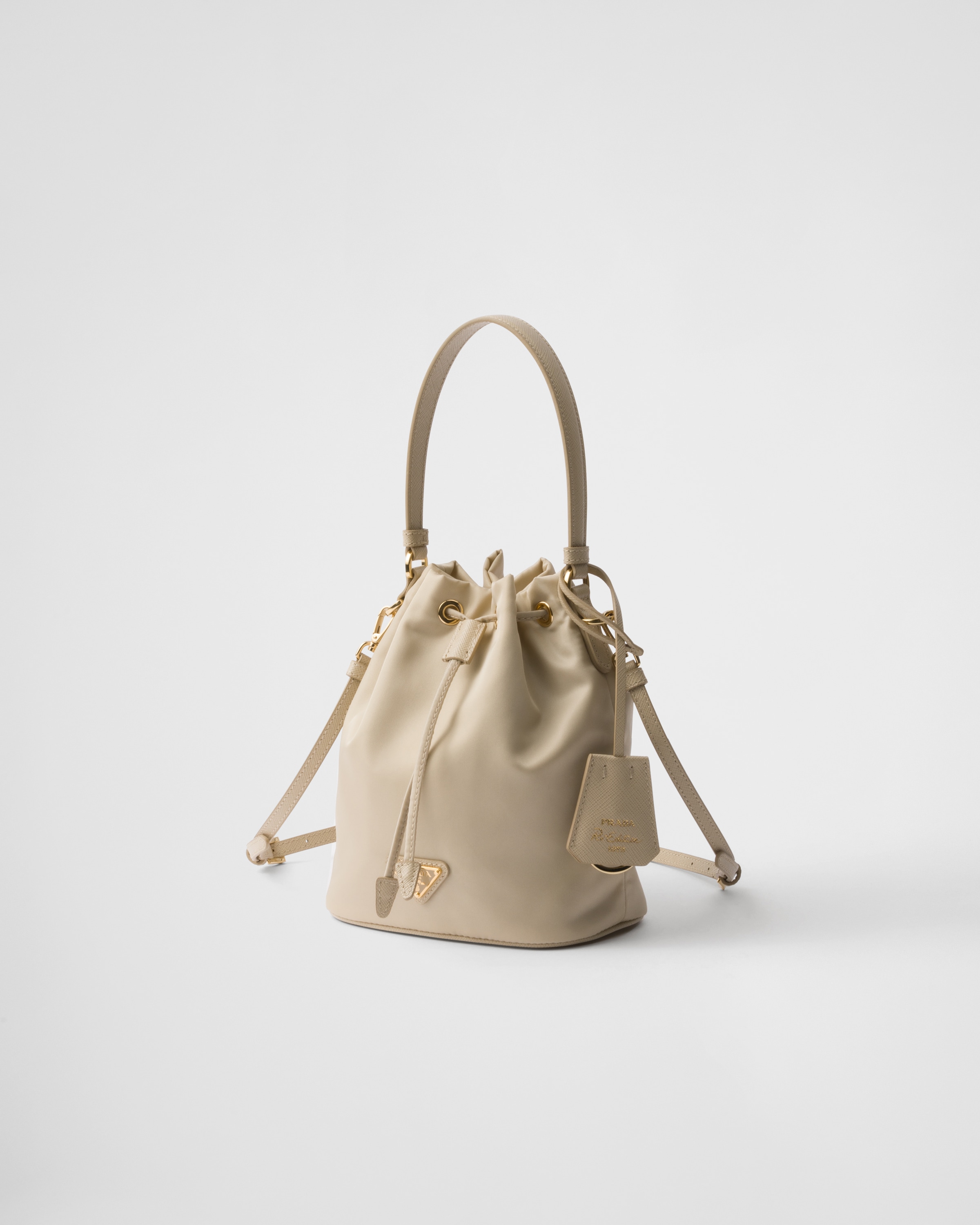 Мини-сумка Prada Re-Edition 1978 из переработанного нейлона Prada, песочный бежевый — фото 2