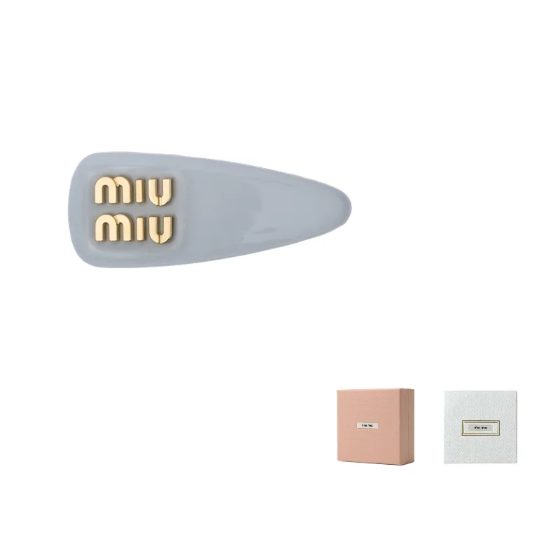 MIU MIU Кожаные металлические заколки для волос Women's Gray