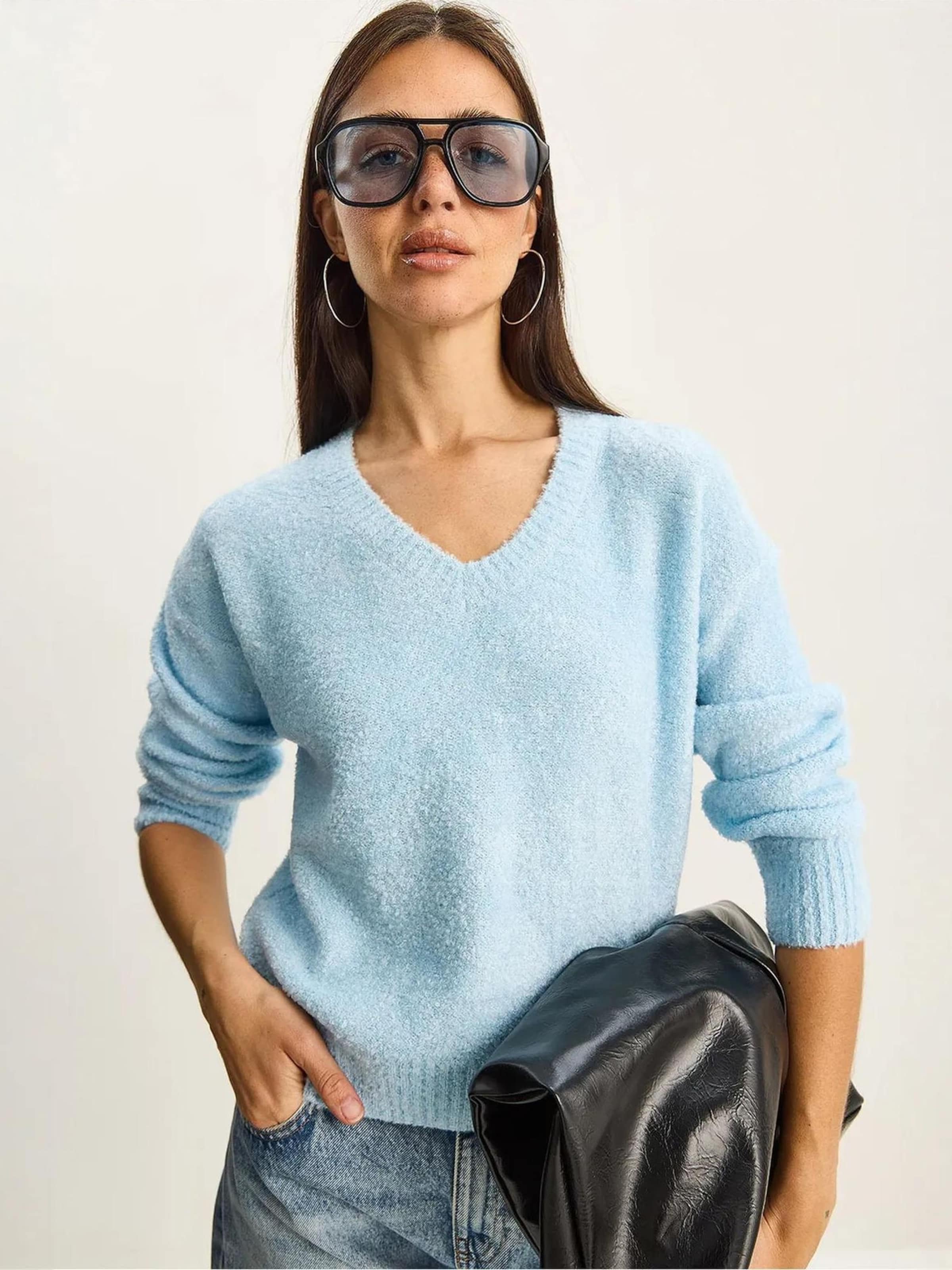 

Bianco Lucci Свитер в светло-голубом цвете