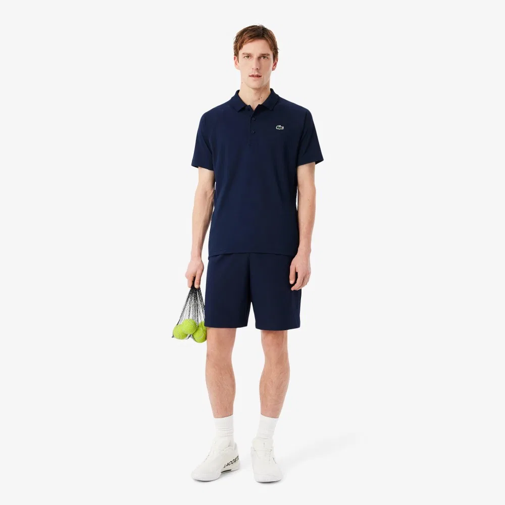 Мужские базовые тканые тренировочные шорты тёмно-синие от Lacoste — фото 4