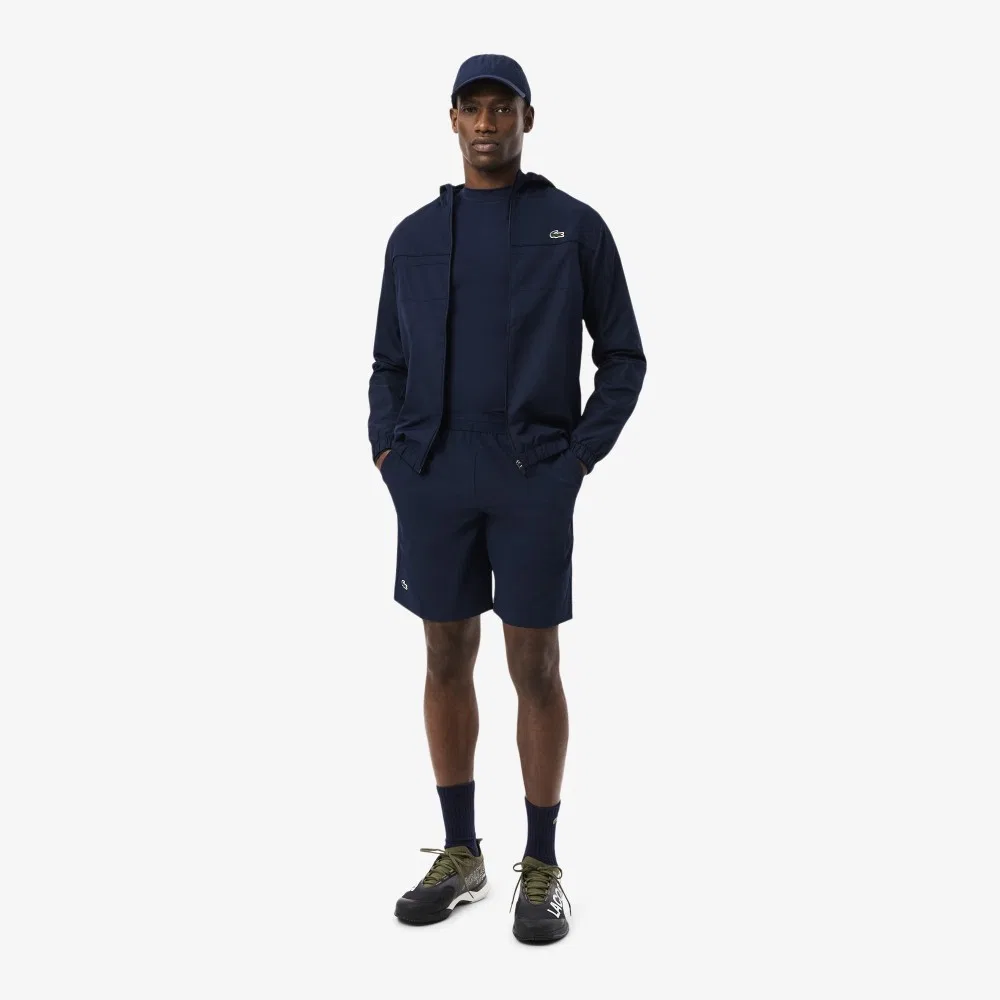 Мужская тренировочная футболка с воротником-стойкой тёмно-синяя от Lacoste — фото 4
