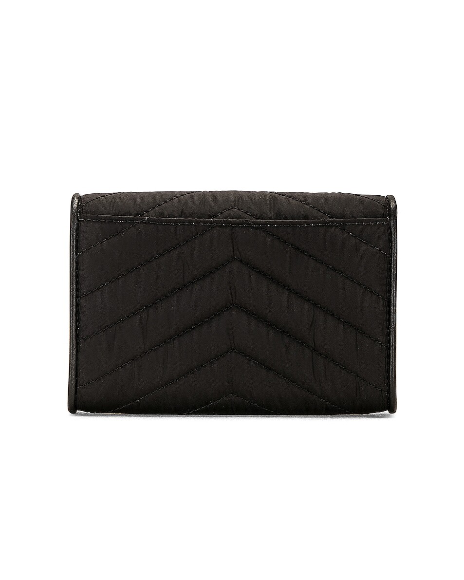 

Маленький кошелек-конверт Saint Laurent, цвет Nero