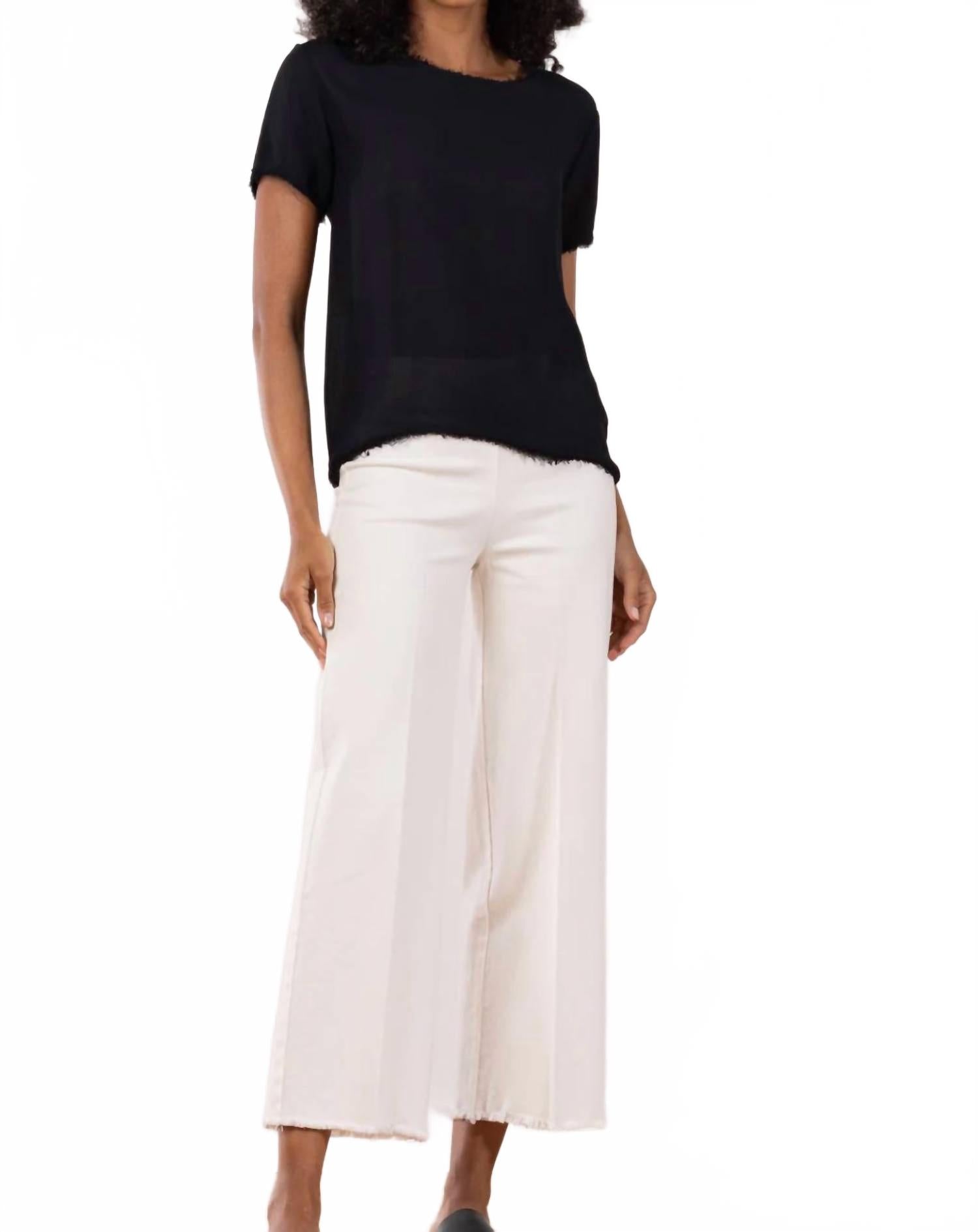 

Alex Широкие брюки с завышенной талией в белом дениме Avenue Montaigne