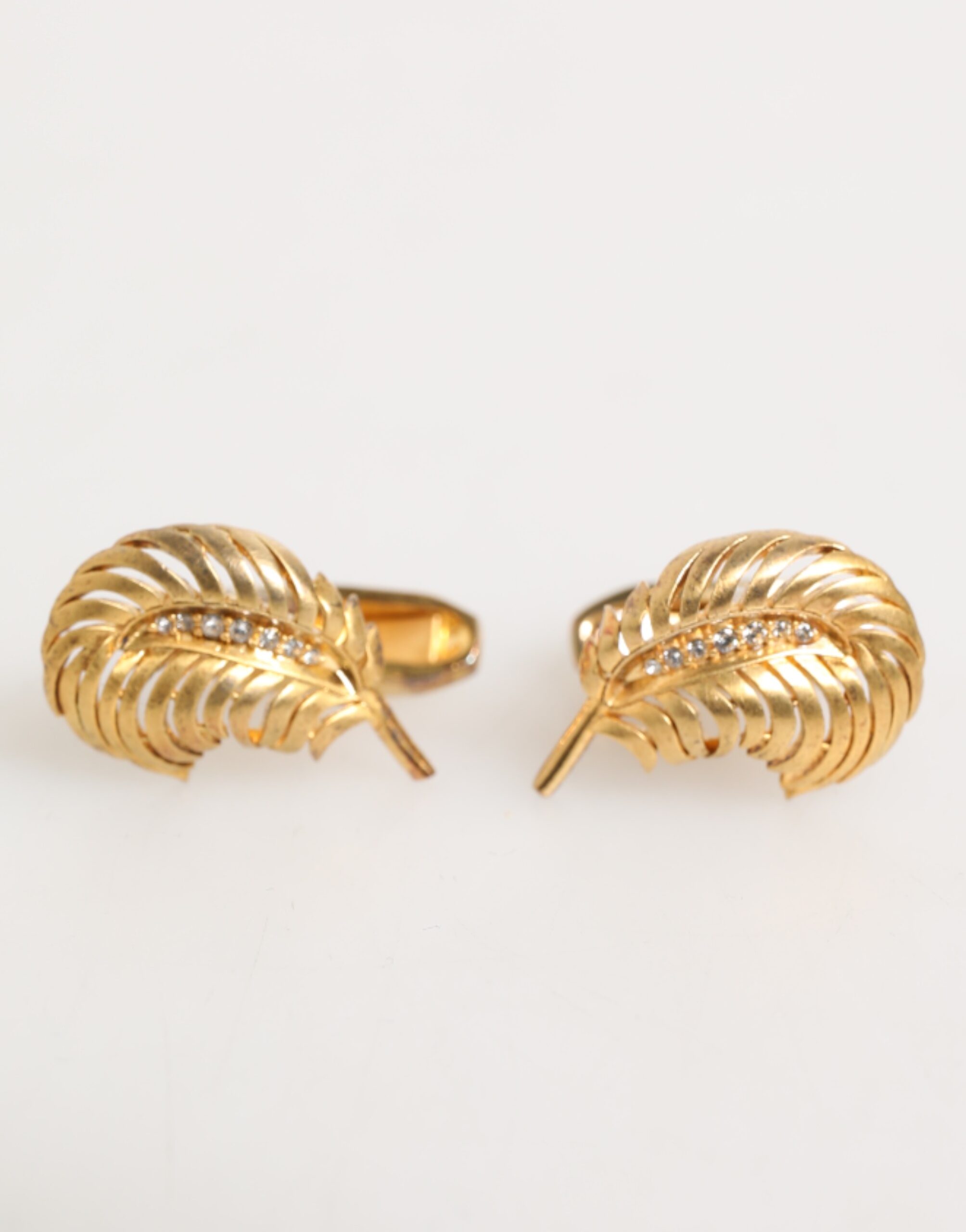 

Запонки из стерлингового серебра 925 пробы с кристаллами в форме листа Dolce & Gabbana, золото