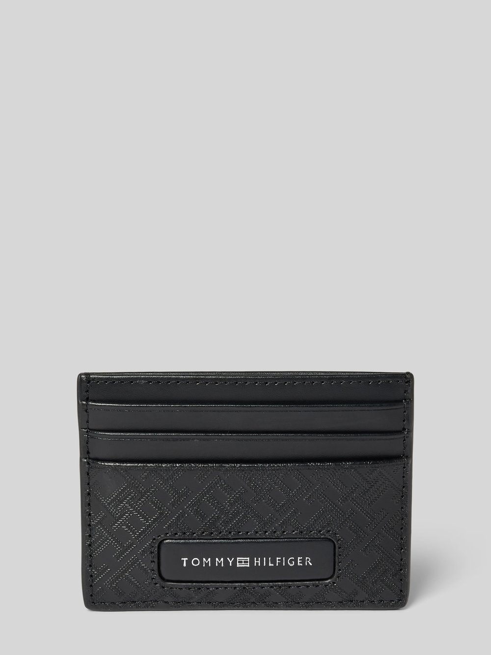 

Кожаный держатель для карт с этикеткой Tommy Hilfiger, черный