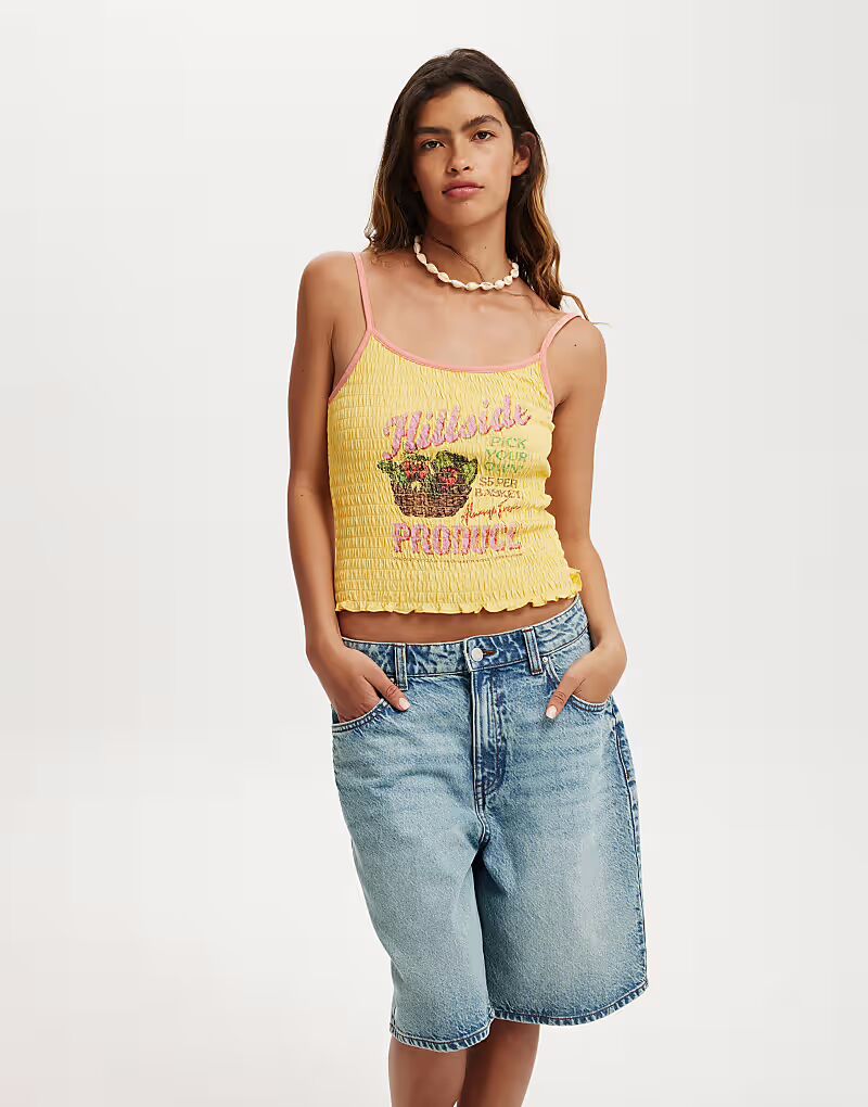 

Топ Cotton:On Urban graphic cami in yellow