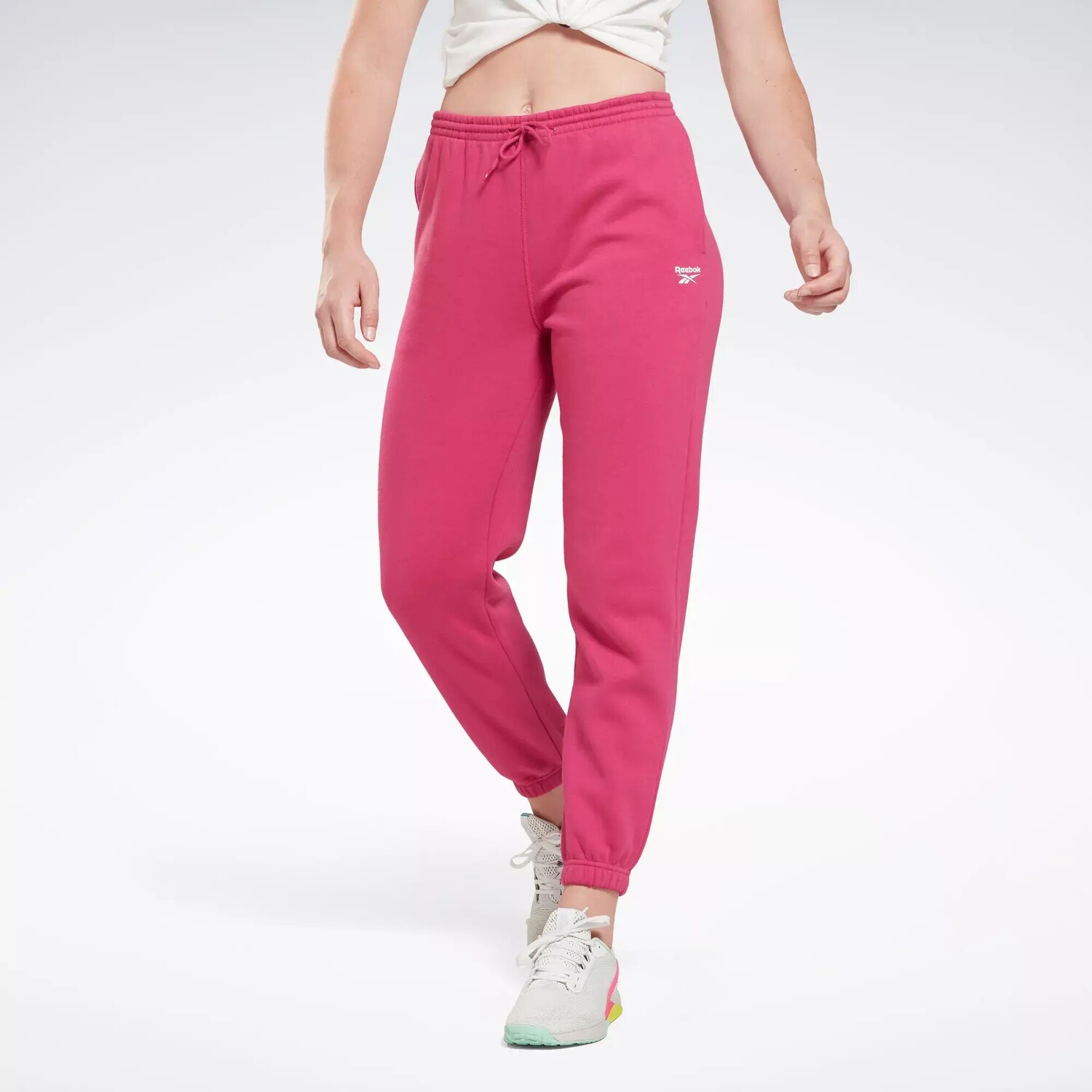 

Флисовые джоггеры Identity Reebok, розовый