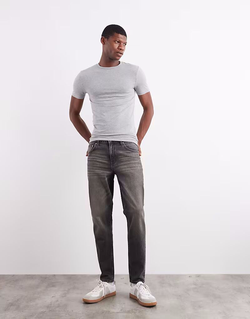 

Зауженные джинсы с желтым оттенком, выбеленного черного цвета Asos Design