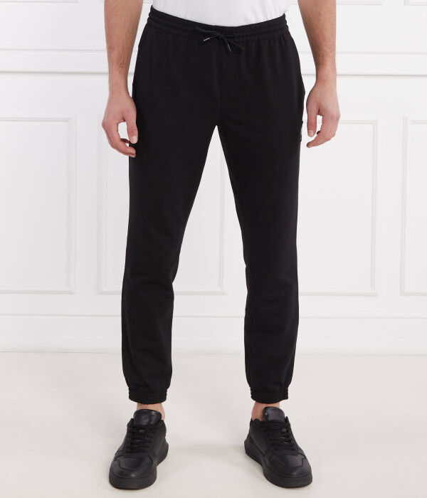 

Спортивные брюки мужские Calvin Klein Jeans облегающего кроя на резинке, черный