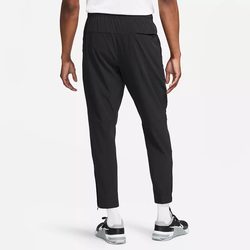 Мужские универсальные зауженные брюки Nike Dri-FIT Unlimited, черный — фото 3
