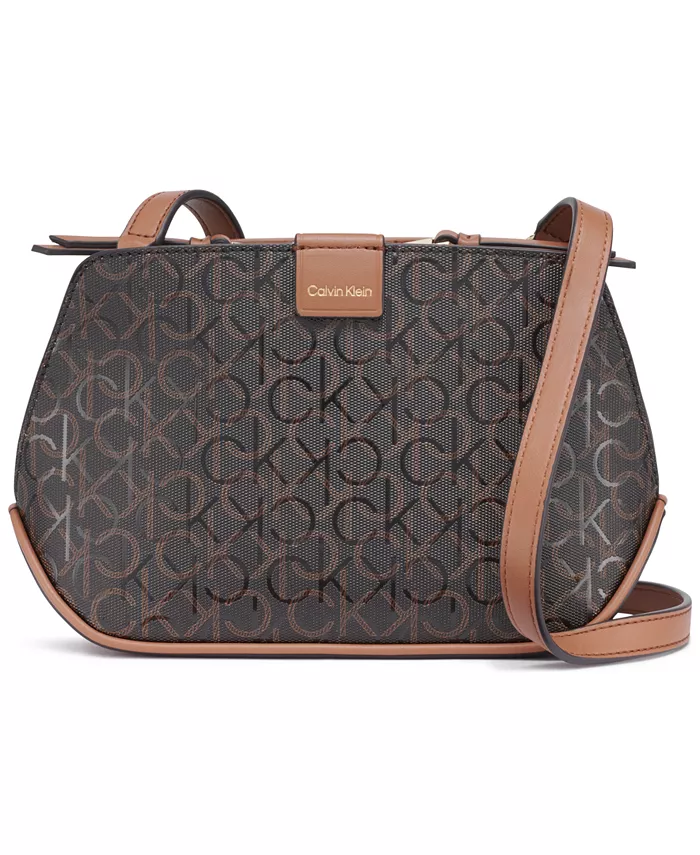 

Оригинальное название: Audrey Textured Emboss Crossbody Перевод на русский: Сумка кросс-боди Audrey с фактурным тиснением Calvin Klein, коричневый
