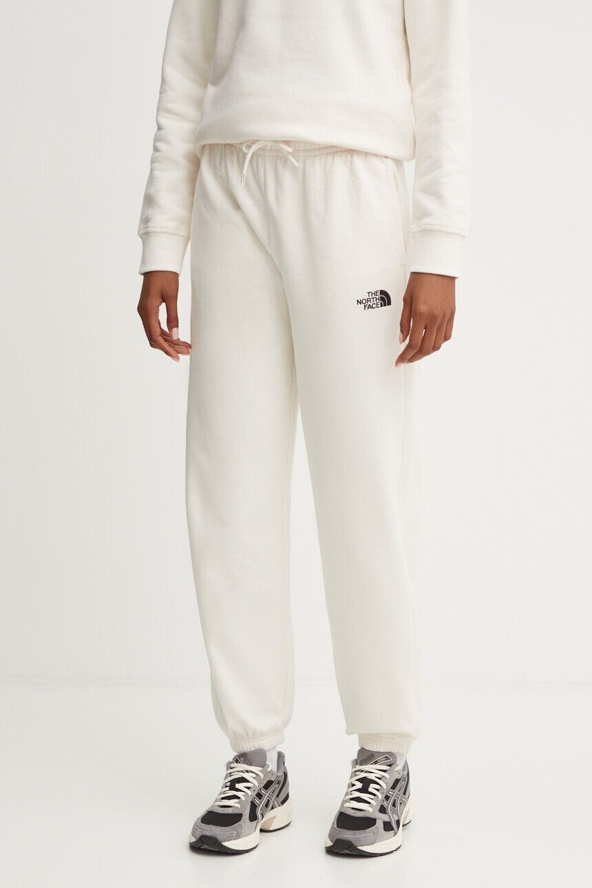 

Хлопковые спортивные брюки Essential Jogger The North Face, бежевый