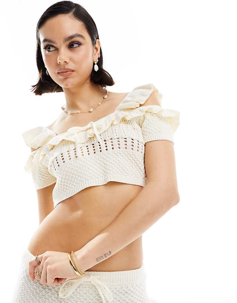 

Кремовый вязаный топ на бретелях с завязками ASOS DESIGN