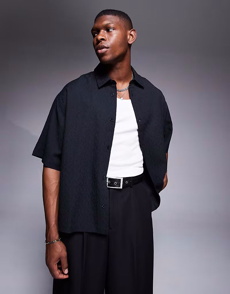 

Рубашка свободного кроя черного цвета с застежкой-кнопкой и текстурированной отделкой Asos Design