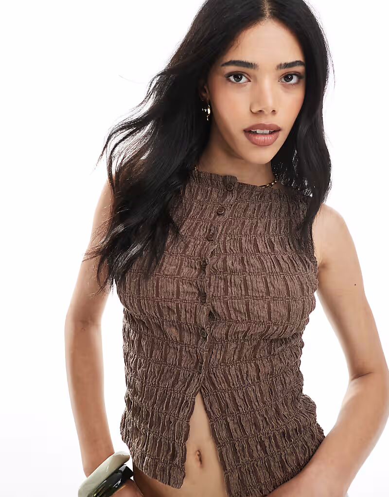 

Жилет ASOS DESIGN с текстурой кислотной стирки на пуговицах, коричневый цвет