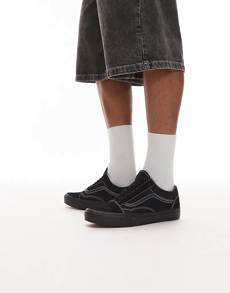 Кроссовки Vans Old Skool в черном цвете с белыми деталями.