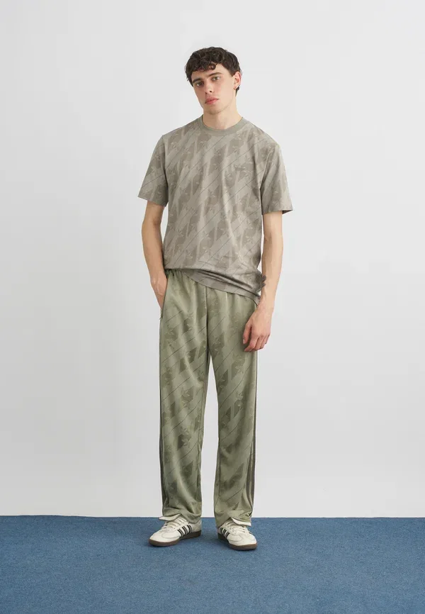 Тренировочные штаны Monogram firebird Adidas Originals, серебристый галька — фото 2