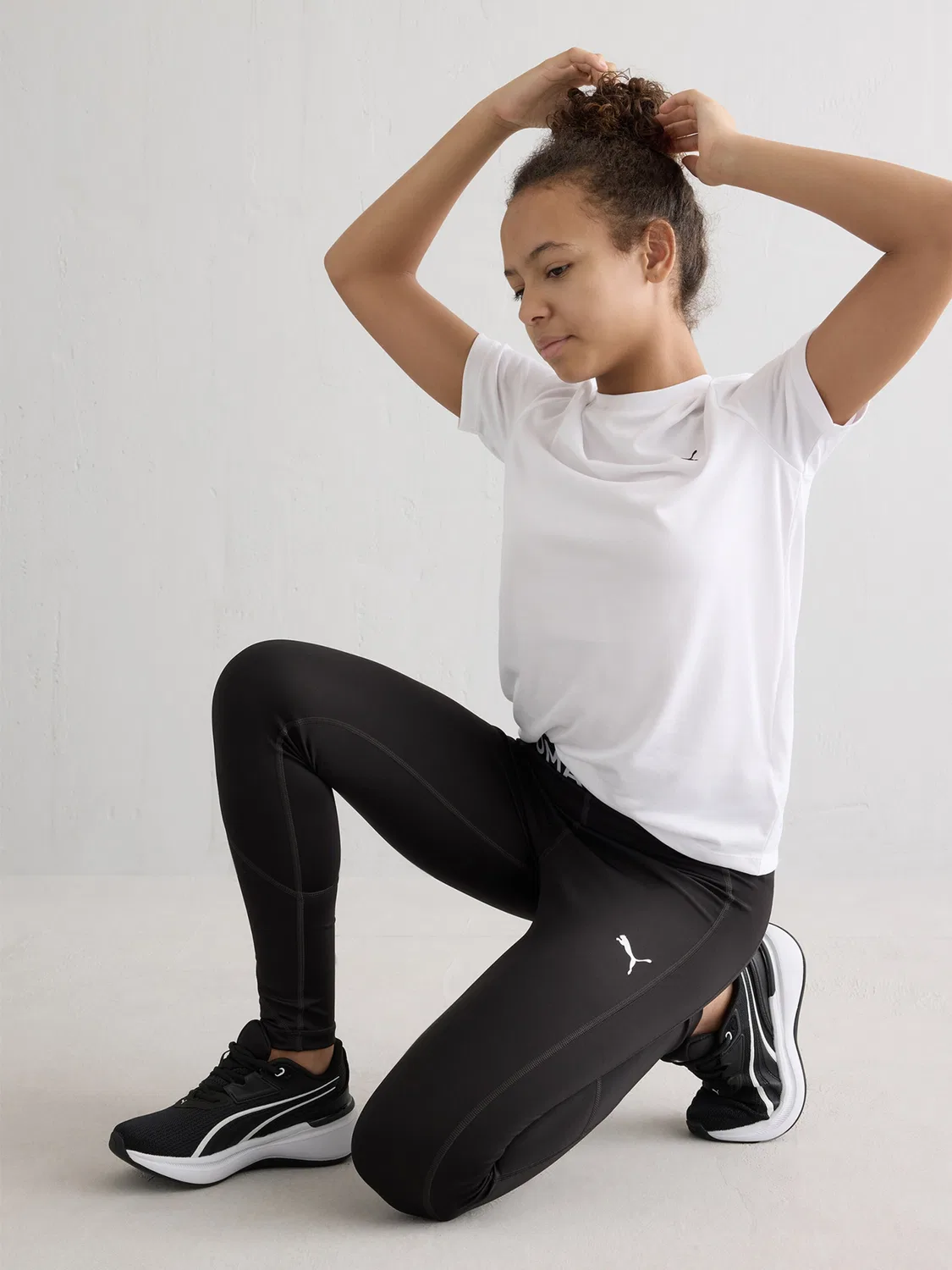 Узкие спортивные брюки Puma Strong черного цвета — фото 4