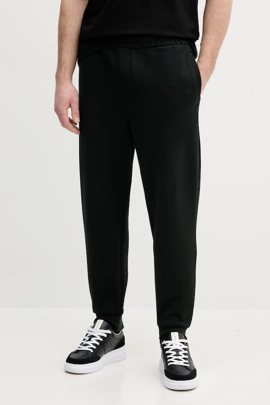

Хлопковые спортивные брюки Armani Exchange, зеленый