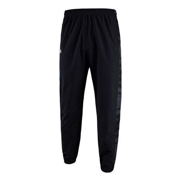 

Брюки quick snap tearaway sweatpants 'black' Under Armour, черный