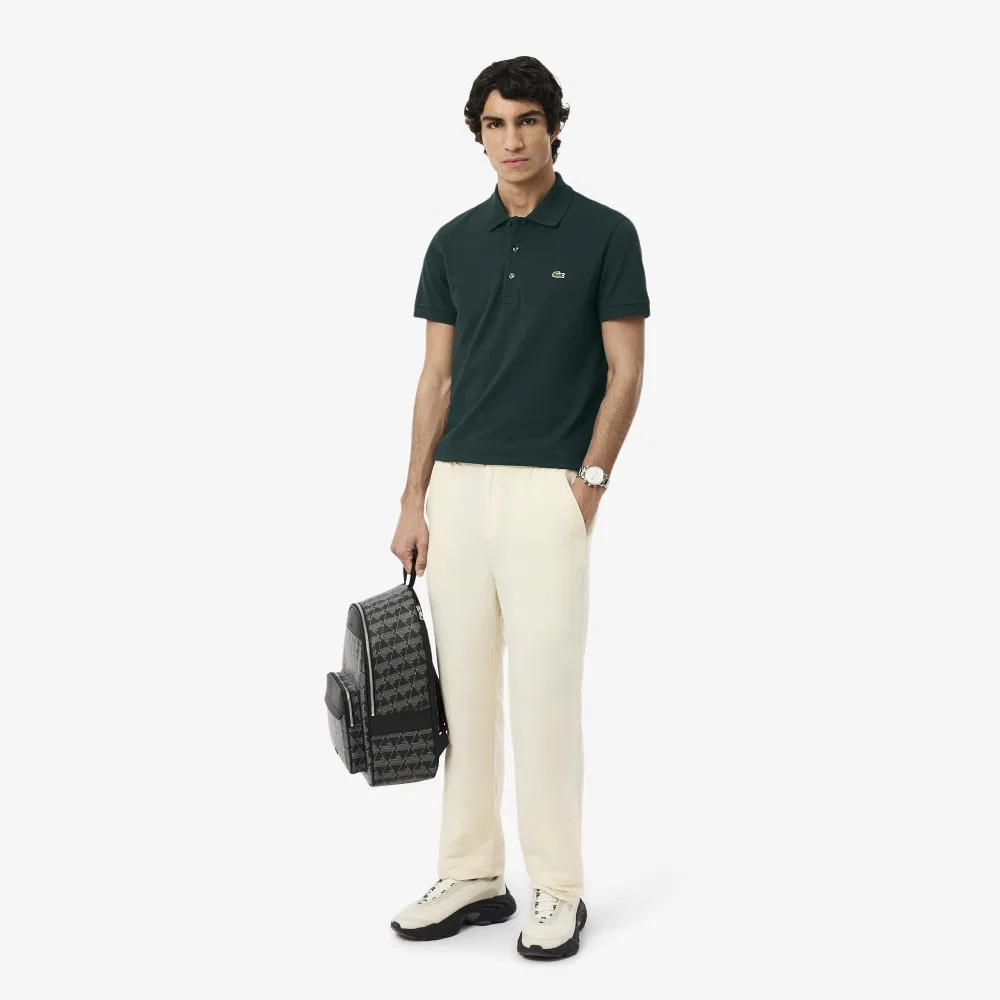 Мужская облегающая футболка-поло с коротким рукавом тёмно-зелёная от Lacoste — фото 4