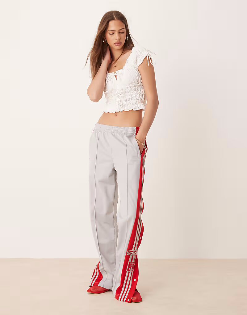 

Спортивные штаны Adidas Originals Adibreak серого и красного цвета