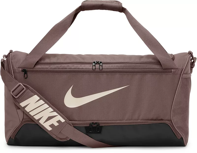 

Спортивная сумка Nike Brasilia 9.5 (средняя, ​​60 л), цвет Smky Muve/Blk/Lt Orwd Brn
