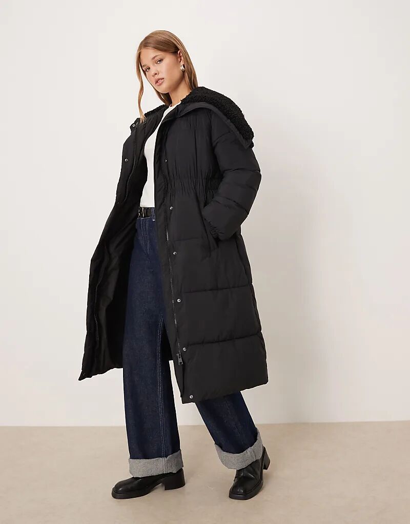 

Пуховик Mango с меховым капюшоном на молнии черного цвета