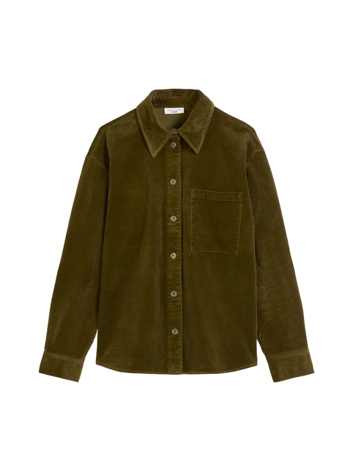 

Marc O'Polo DENIM Блузка свободно лежит на фоне полированных поленьев