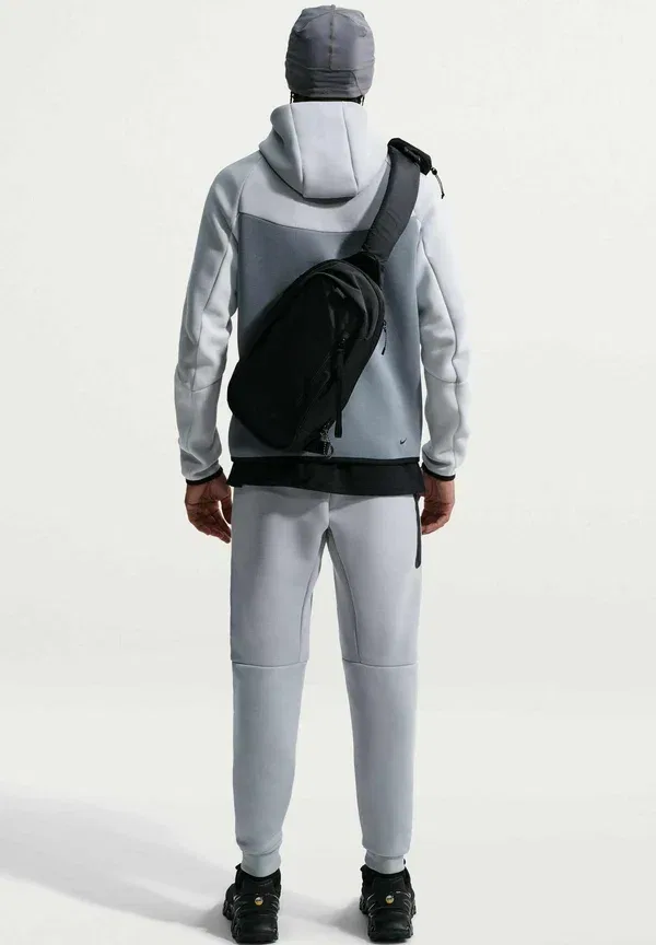 Спортивные штаны Nike Sportswear M nk tch flc jggr tracksuit bottoms, светло-серебристый черный — фото 2