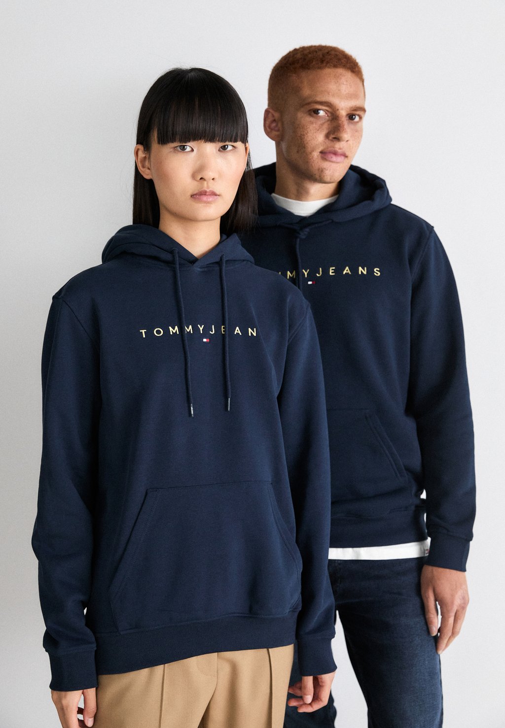 

Толстовка с капюшоном LINEAR HOOD UNISEX Tommy Jeans, темно-синий