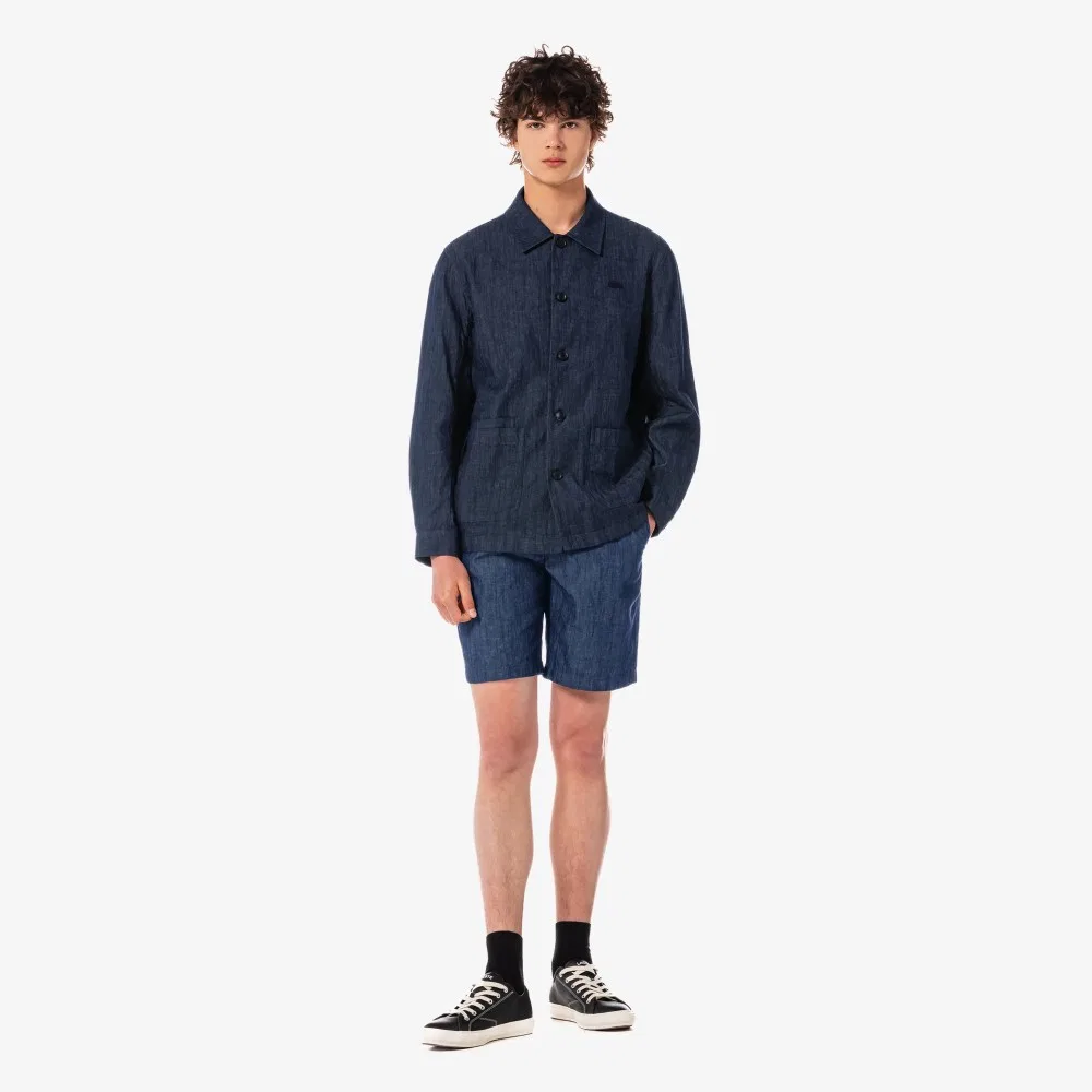 Мужские джинсовые бермуды синего цвета от Lacoste