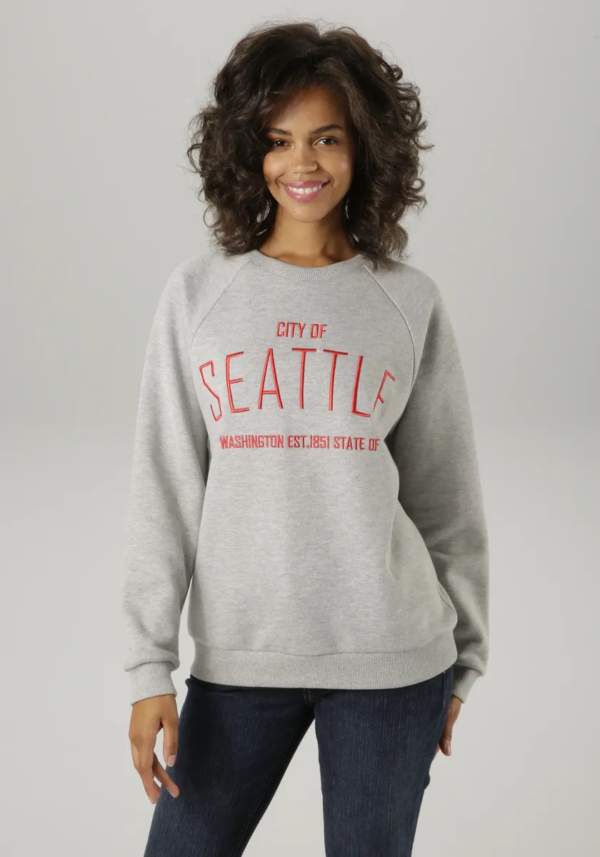 

Толстовка Aniston CASUAL с вышитой надписью SEATTLE - НОВАЯ КОЛЛЕКЦИЯ, красный