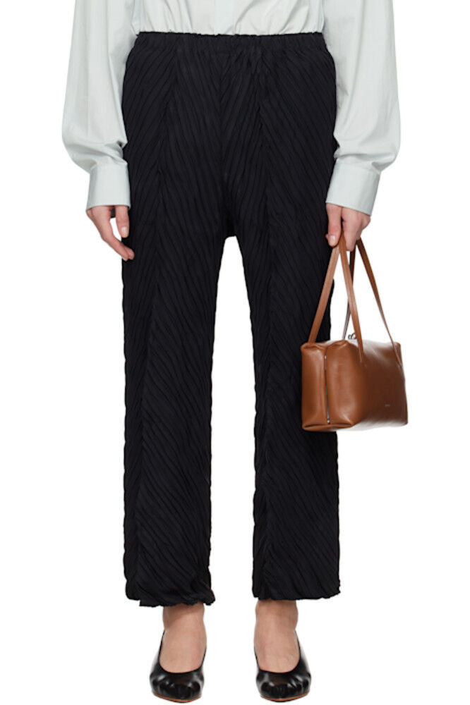 

Черные мятые и перекрученные брюки ISSEY MIYAKE