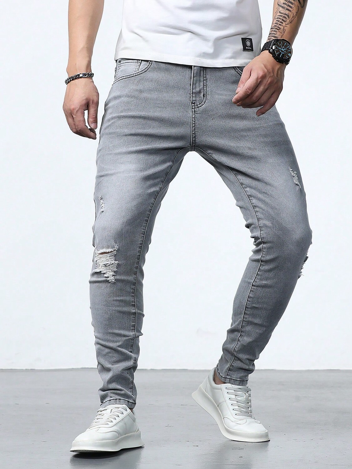 

Джинсы-скинни мужские Manfinity Homme с потертостями, серый