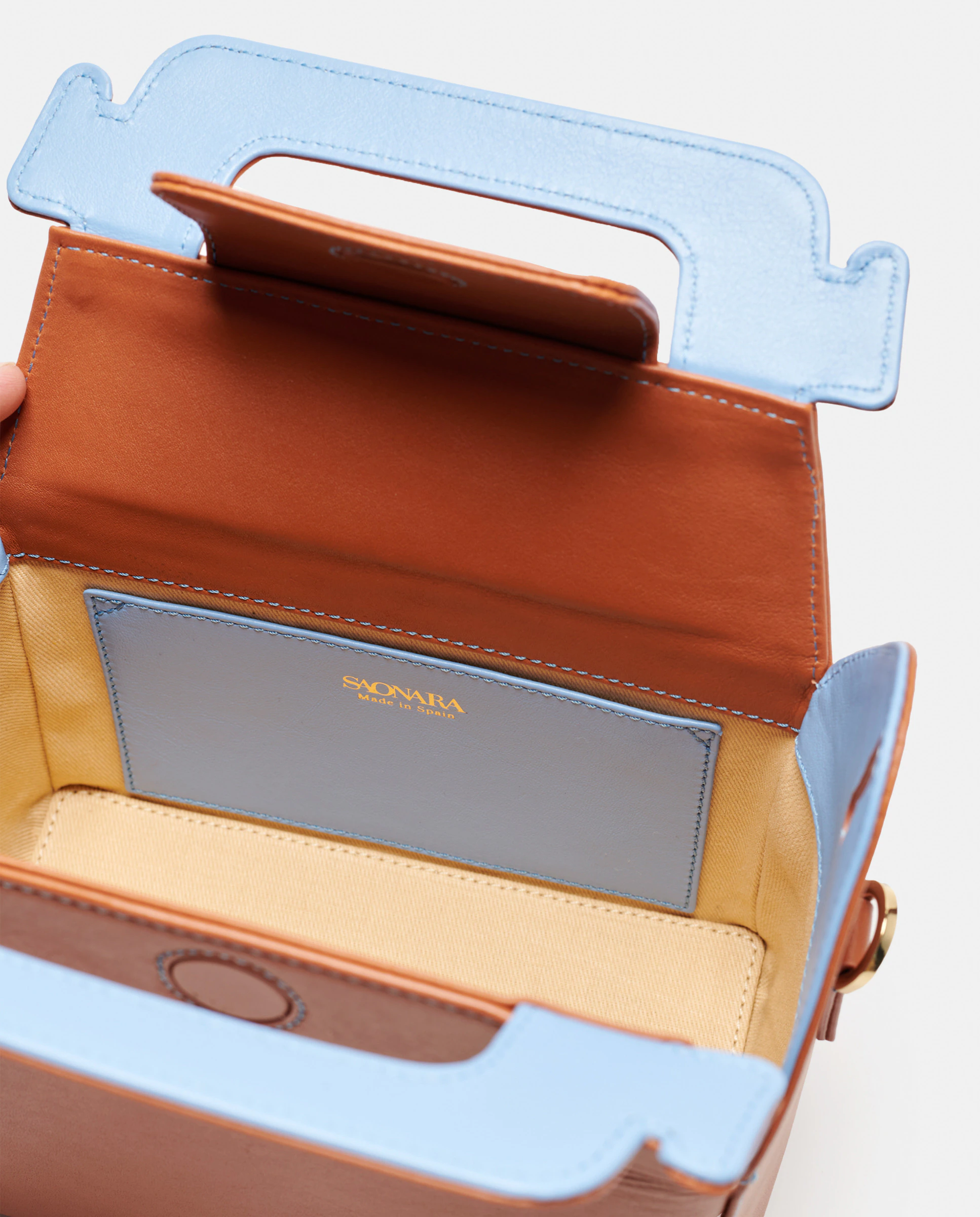 

Средняя кожаная сумка через плечо с ручкой Saonara, коричневый