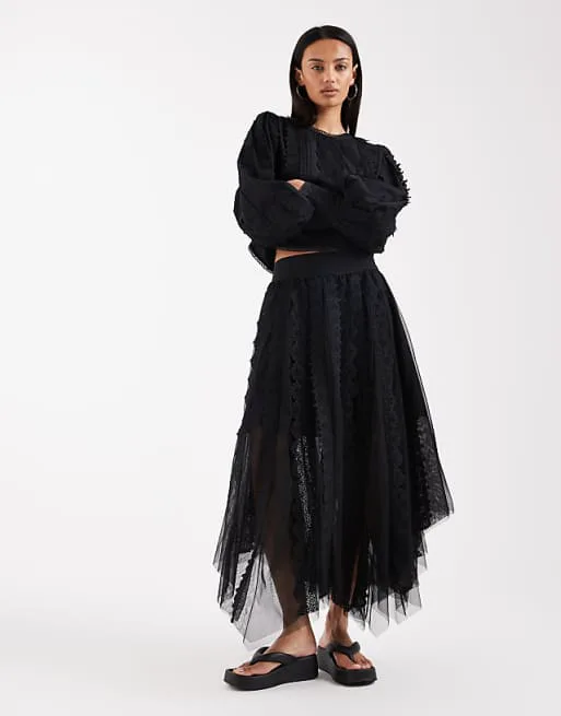 

Черная юбка миди из тюля с оборками AllSaints Vashtie асимметричного кроя