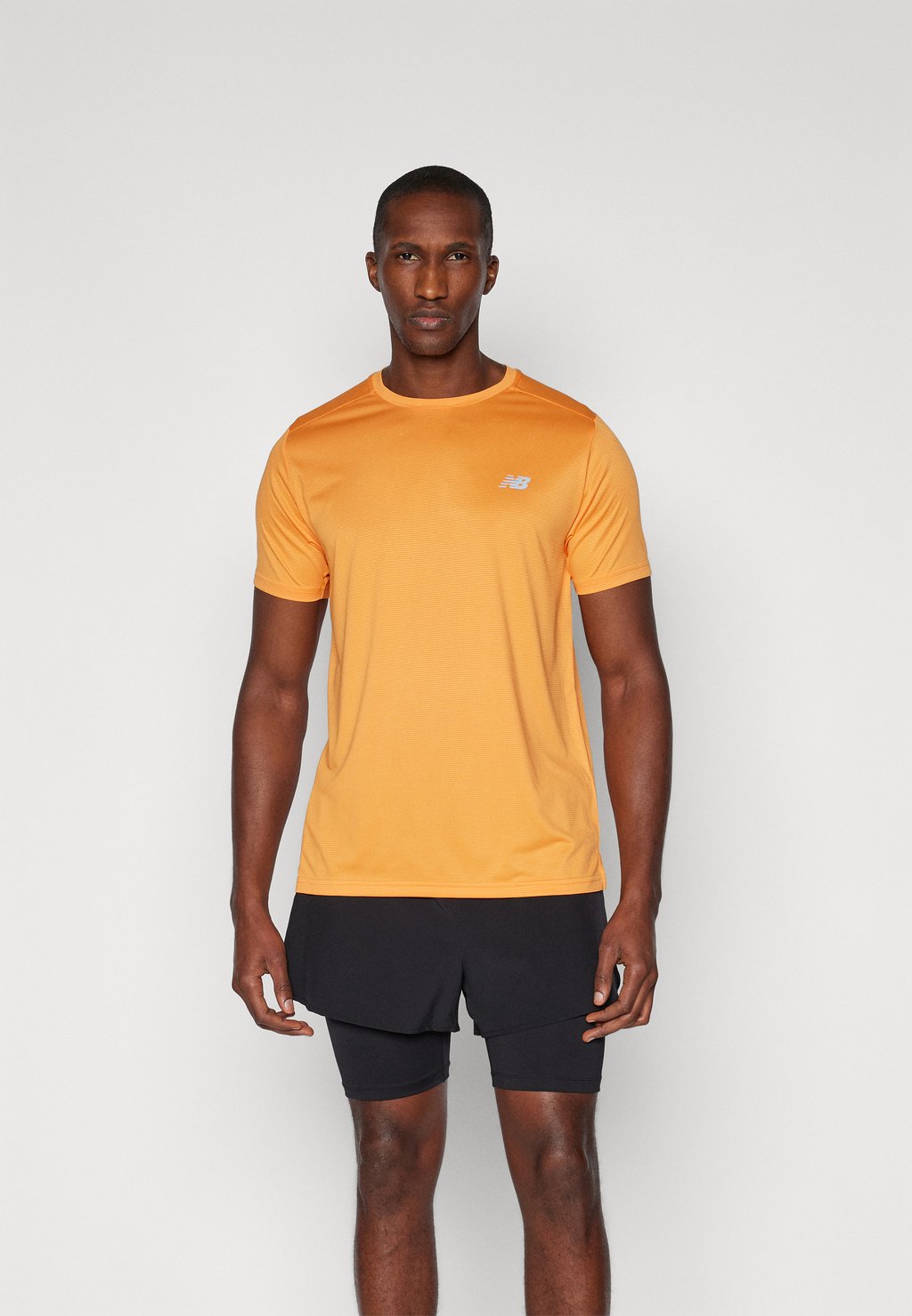 

Спортивная футболка SPORT ESSENTIALS New Balance, оранжевый